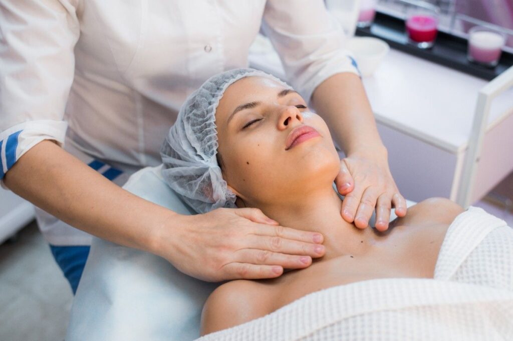 young-woman-enjoying-facial-at-spa-salon